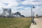 Fire crews battle tire fire near 14th and Grace