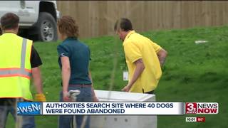 Police search site where 40 dogs were abandoned