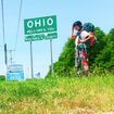 Girl rollerblading across the country